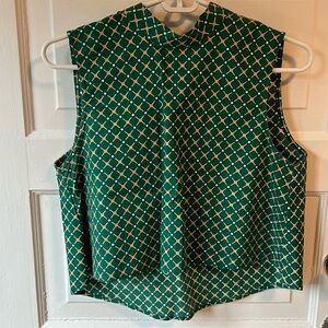 Green crop top- sleeves less and  high neck with bow detail